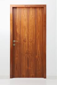 Marble Flooring Offset By Genuine Teak Wood Doors And Furniture Design By Interior Designers In Mu Room Door Design Main Door Design Commercial Interior Design