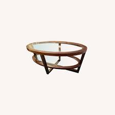 Shop used raymour & flanigan cabinets & sideboards on sale on kaiyo. Raymour Flanigan Oval Two Tier Glass Wood Coffee Table Aptdeco