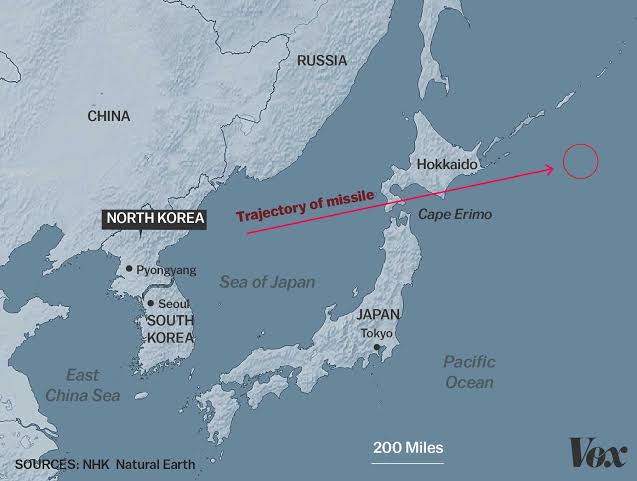 A military map showing the Korean Peninsula with an arrow indicating a missile trajectory into the Sea of Japan.