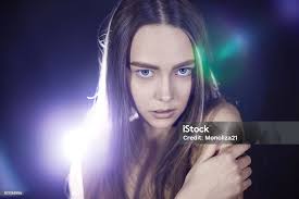 Beautiful Girl In The Light Of A Searchlight Violet Stock Photo