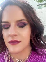 Lipstick-stained photo of a purple look