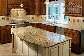 The staff's customer service, knowledge of materials and overall industry expertise is second to none. Granite Countertops With Mixed Wood Cabinets Kitchen Renovation Kitchen Design Kitchen Countertops