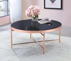 From classic wood to contemporary acrylic, find for a natural take, opt for wood, or go with brass, chrome or gold to bring some shine to the space. 723248 Mercer 41 Round Rose Gold Finish Metal And Black Glass Coffee Table