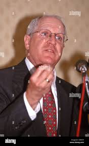 Minnesota Attorney General Hubert Humphrey III holds an internal RJR  document stating that tobacco causes lung cancer while testifying