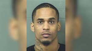 Father accused of taking AK-47 to FL school after son said teacher 'slammed  him'