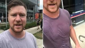 Dean Wells drenched with sweat after workout