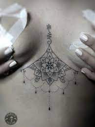 See more ideas about underboob tattoo body art tattoos and body jewelry. Pin On Tattoos Designs