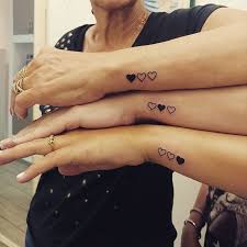 Wrist tattoo with butterfly and heart. Small Wrist Tattoo Ideas Popsugar Beauty