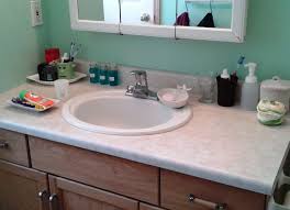 1.5 paint laminate to look like granite. Organize Bathroom Countertop For Free Or One Cheap Plate Countertop Organization Bathroom Countertops Organize Bathroom Countertop