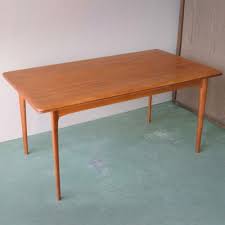 35.50 inches deep x 79.00 inches wide x 29.75 inches high. Erik Buck Dining Table 1950s 17323