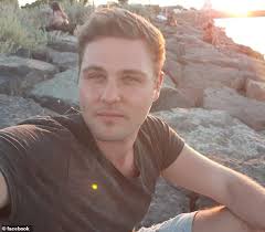 Deadly snakes wrap themselves around a makeshift Christmas tree