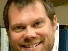 Professor running amputee research