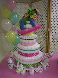 See more ideas about baby shower gifts, baby diaper cake, baby diapers. Easy Diaper Cake Directions Baby Diaper Cake Diaper Cakes Girl Diaper Cake