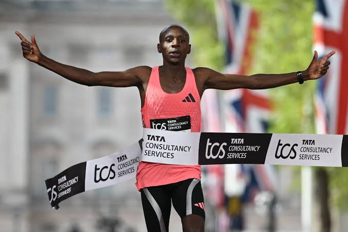 Sabastian Sawe crossing the finish line at the 2026 London Marathon in record time