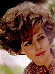See 7 Big Pictures Of The Hottest Short Hairstyles From The 60s Short Burgundy Hair Big Curls Short Hair Short Hair Styles