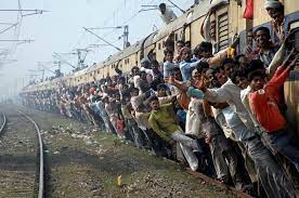 A crowded train frozen still in the night. 14 Incredible Photos Show Crazy Crowded Train In India Living Nomads Travel Tips Guides News Information Indian Railways India Photography Incredible India