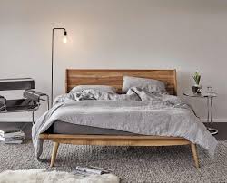 Dania The Nordic Inspired Bolig Bed Is Crafted From Solid Poplar And Features A Warm Stai Scandinavian Design Bedroom Modern Apartment Decor Bedroom Interior