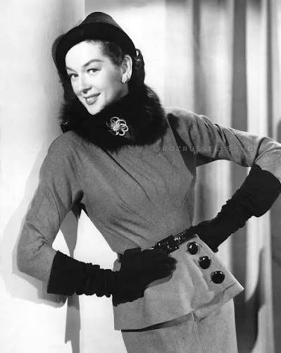 Roz always believed that she looked best in suits—she called herself a  "suit woman"—and one can definitely see why she believed so in these  photographs taken for Never Wave at a WAC (