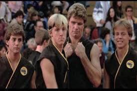 Sweep The Leg Petulant Bully Johnny Lawrence 2nd From The Right Amongst His Cobra Kai Brethren In 1984 Karate Kid Movie The Karate Kid 1984 Karate Kid