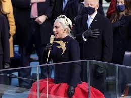 Not only was lady gaga rocking a giant dove broach that resembles the famous mockingjay from the hunger games, but she wore braids in her hair, which was the signature style of katniss everdeen you can check out some of the best tweets comparing lady gaga to the hunger games below. The Powerful Message Behind Lady Gaga S Statement Inauguration Brooch The Independent