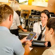 Man Paying With Credit Card At Cafe Woman Service Cashier Stock Photo,  Picture and Royalty Free Image. Image 15262849.