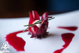 This ruby red hibiscus syrup has sweet, tart, and floral accents that will add extra zing and beautiful color to your homemade cocktails. Wild Hibiscus Flowers In Syrup Food Recipes Flower Food