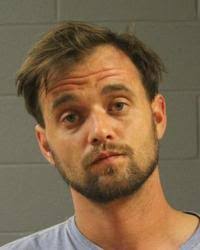 Man arrested after crashing into Main Street roundabout