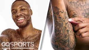 Damian lillard s 18 tattoos their meanings body art guru. Damian Lillard Breaks Down His Tattoos Gq Sports Youtube