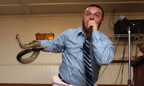 Image result for photo of people in church with rattlesnakes