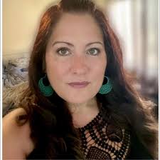 Should I visit Grand Bend beach or Tobermory for a night or two?