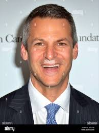 Joe Cohen of Creative Artists Agency, who received the Gil Nickel  Humanitarian Award, poses with his wife Ami, right, son Jack, left, and  daughter Lili, second left, at the UCLA's Jonsson Cancer