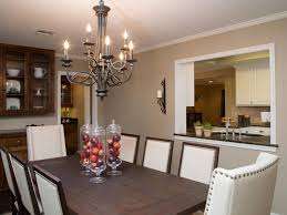 Classic rectangular tables strike the perfect chord for formal and contemporary settings. Formal Dining Room With New Chandelier And Modern Table And Chairs Hgtv