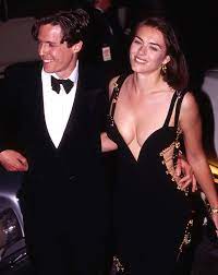 Angelina jolie's black velvet 'leg' dress at the 2012 oscars 5. Elizabeth Hurley Says Her Versace Safety Pin Dress Still Fits