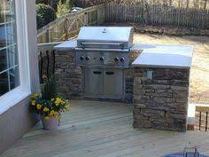 The larger, higher tier is about 18 by 10 feet; 24 Small Outdoor Kitchens Ideas Small Outdoor Kitchens Outdoor Kitchen Outdoor