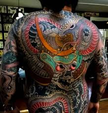 Snake tattoos can be done in some unusual colors, such as this bright blue. Japanese Snake Tattoos Hebi Tattoo Symbolism Design Ideas Tatring