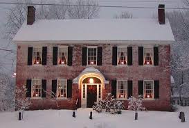 Love This I Leave Candles In My Windows All Year Round But At Christmas I Put Wreaths On Every Window With Bea Colonial House House Exterior White Wash Brick