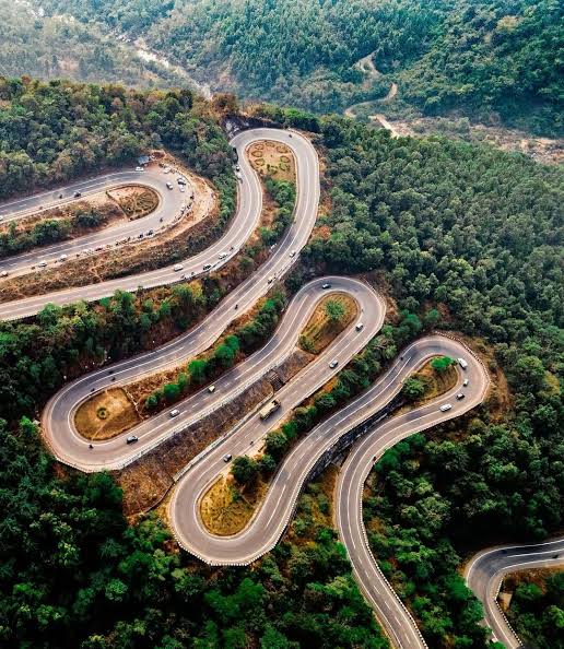 The serpentine roads of Patratu Valley, AI generated