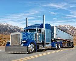 Aut 07 Rk0444 01 C Kimball Stock 1993 Peterbilt 379 Blue With Flames 3 4 Front View On Road By Mountains Custom Trucks Trucks Peterbilt