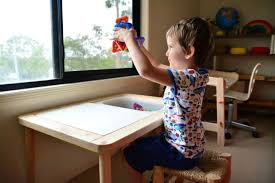Otis Using The Ikea Flisat Children S Table At How We Montessori 89 97 With Tubs Adjustable Height Childrens Table Childrens Desk Ikea Kids
