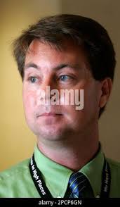 Don Krupp, chief of the vehicle analysis branch at Marshall Space Flight  Center, talks about the design of the next generation moon rockets while  talking with a group of journalists, Thursday, Aug.