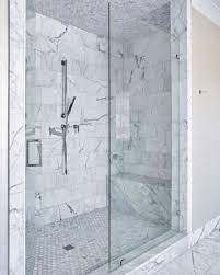 White Marble Shower Tiled Ceiling Walls And Floor Bathroom Design By Jenkins Interiors Jenkinsinteriors C Glass Shower Doors Glass Shower Marble Showers