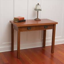 Whether you love mission or shaker style, we pride ourselves in using a variety of sturdy and beautiful wood species so that your new furniture will stand the test of time. The Mission Style Console To Card To Dinner Table Hammacher Schlemmer