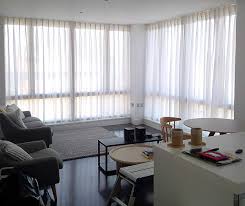 Contemporary Curtains For Large Windows Or Floor To Ceiling Windows N1 How to hang curtains high & wide (the window looks bigger).