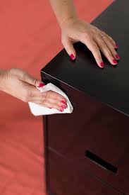 If you can't remove them, cover them with masking tape to protect them from the paint. Beautiful Filing Cabinet Makeover Hgtv