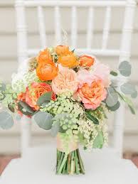 Silk flowers also come in orange. Wedding Bouquets Peach And Orange Bouquet Photo By Trini Mai Photography Ruffledblog Com W Wedding Lande Leading Wedding Magazine Ideas Inspirations The Hottest New Wedding Trends