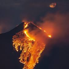 Lava is molten rock (magma) that has been expelled from the interior of a terrestrial planet (such as earth) or a moon. Mount Etna Illuminates Night Sky With 1 500 Metre Lava Fountain Volcanoes The Guardian