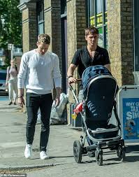 In may 2013, daley announced that he was bisexual, though later said that he was gay. Tom Daley Steps Out With Son Robbie And Husband Dustin Lance Black After Buggy Row Daily Mail Online