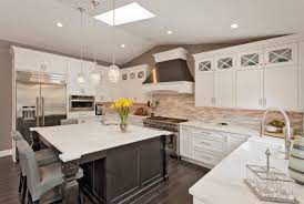 I like to specify medium or darker gray cabinets in kitchens that have a white or super light wall color on the walls. Dark Cabinets With White Island Kitchen Ideas Photos Houzz