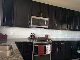 White Glass Subway Tile Backsplash With Dark Cabinets White Subway Tile Backsplash Trendy Kitchen Backsplash