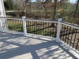 Todd and i had a great time breaking away the deck components. White Trex Transcends Railing With Round Black Balusters Trex Island Mist Rail Cap And Trex Pyramid Pos Decks And Porches Gazebo On Deck Deck Designs Backyard